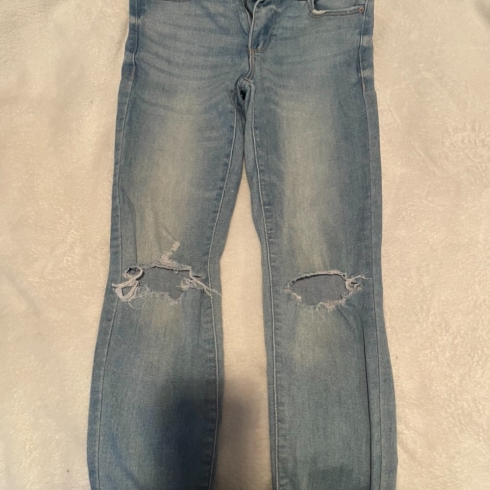 Garage skinny jeans with rips at the knees, size 1